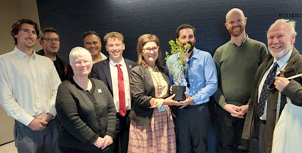 From left: Lee Oliver (VuW), Carlos Lehnebach (Te Papa), Carol West (Ōtari-Wilton’s Bush Trust), Crs Matthew Reweti, Sam O’Brien, Laurie Foon and Ben McNulty (with the mahoe), Johnny Osborne and ecologist Rob Smith.